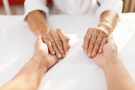 Providing care and support for elderlyの写真素材