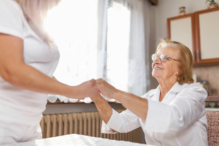 Providing care and support for elderlyの写真素材
