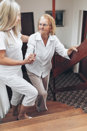 Providing help and support for elderly peopleの写真素材