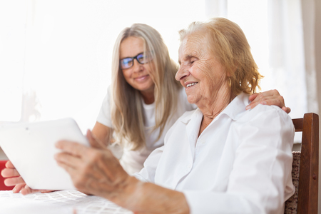 Providing care and support for elderlyの写真素材