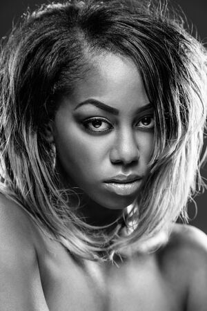 Face of an young black beauty in black and whiteの写真素材