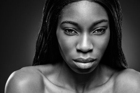 Face of an young black beauty in black and whiteの写真素材