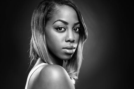Face of an young black beauty in black and whiteの写真素材