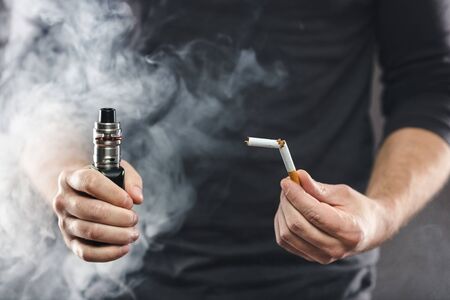 Vaping flavored e-liquid from an electronic cigaretteの素材 [FY310139802324]