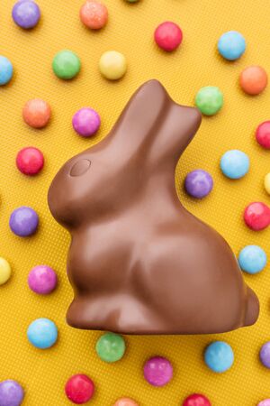 Delicious Easter holiday chocolate bunny, eggs and sweetsの写真素材
