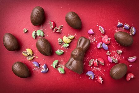 Delicious Easter holiday chocolate bunny, eggs and sweetsの写真素材