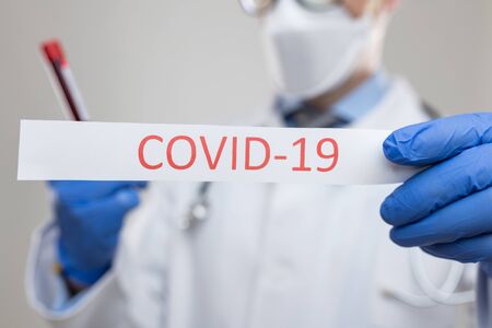 Doctor with a respiratory mask fighting the deadly Coronavirus Covid-19 viral epidemic の写真素材