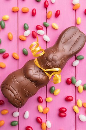 Delicious Easter holiday chocolate bunny, eggs and sweetsの写真素材