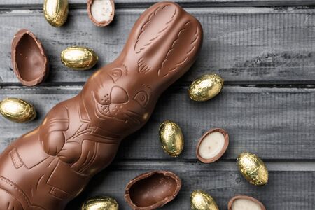 Delicious Easter holiday chocolate bunny, eggs and sweetsの写真素材