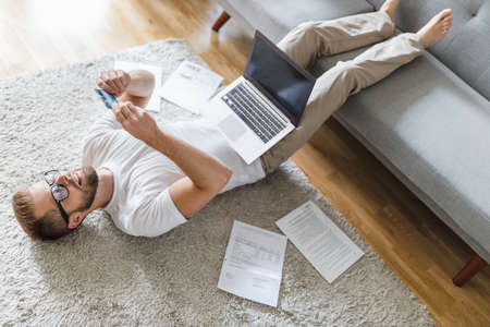 Man working from home during the   pandemicの写真素材
