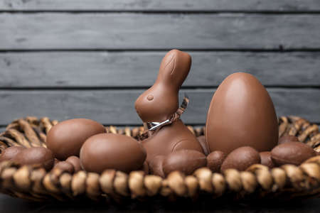 Delicious Easter holiday chocolate bunny, eggs and sweetsの写真素材