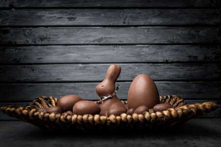 Delicious Easter holiday chocolate bunny, eggs and sweetsの写真素材