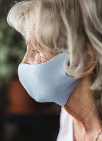 Elderly woman with a face mask during lockdown