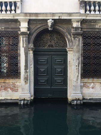 Door on the canal (Venice, Italy)のeditorial素材
