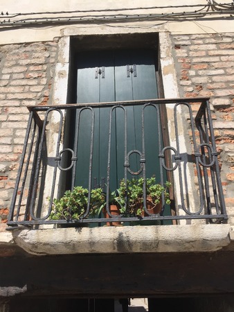 A balcony in Venice - Venetian architecture (Venice, Italy)の写真素材