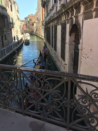 Gondolier on the canal - Lifestyle (Venice, Italy)の写真素材