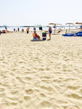 Old ladies on the beach (Pesaro, Italy)の写真素材