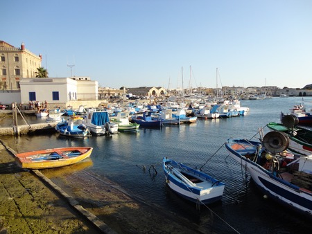 The red and yellow boat in the harbor (Sicily, Italy)のeditorial素材