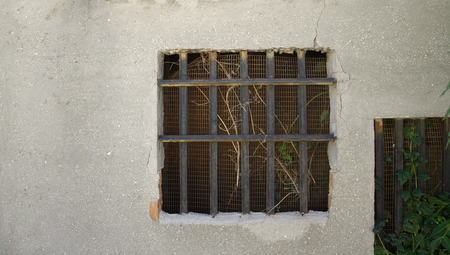 Iron gratings on the window (Pesaro, Italy)の写真素材