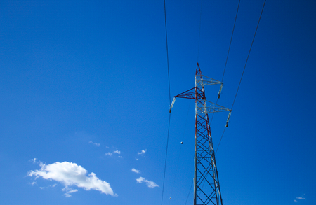 Electricity tower - Transmission tower - Power line in the sky (Urbino, Italy)の写真素材