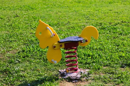 Games at playground - Spring Horse (Pesaro, Italy)の写真素材