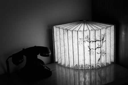 Chinese book lamp and vintage telephone - Interior design (Pesaro, Italy)の写真素材