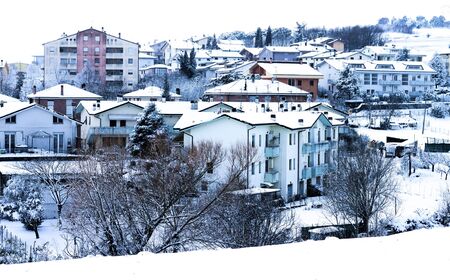 Snow on the roofs of the city (Pesaro, Italy)の写真素材