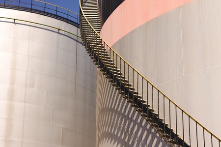 Oil storage tank with metal bridge and stairs (Pesaro, Italy, Europe)の写真素材