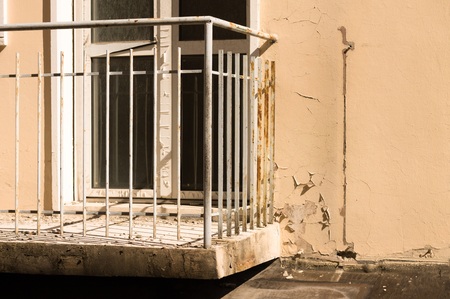 Ruined and rusted balcony of an abandoned house (Pesaro, Italy, Europe)の写真素材
