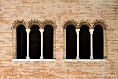 Medieval windows with round arches - Roman style details (Fiastra Abbey, Marche, Italy)