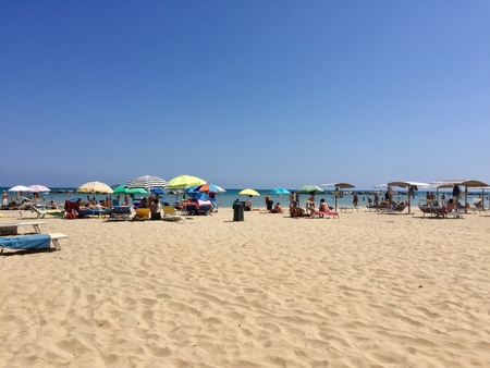A lot of people under the beach umbrellas (Pesaro, Italy, Europe)のeditorial素材