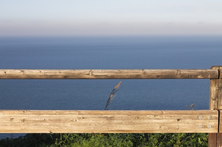 Wooden railing over the sea (Pesaro, Italy, Europe)の写真素材