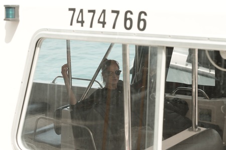 Male, Maldives - 20 December 2018: Isolated young woman in a ferry boatのeditorial素材