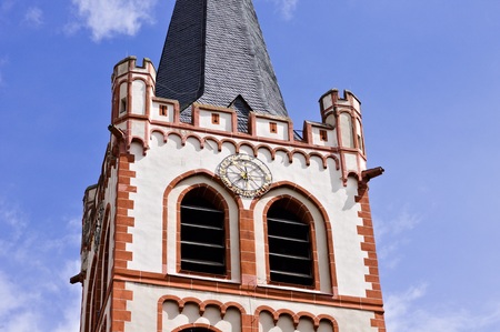 Bell tower and clock tower details of an evangelical gothic church (Bacharach, Germany, Europe)