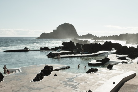 Porto Moniz, Madeira, Portugal - August 24, 2019: Panoramic view of natural pools surrounded by black volcanic rock.のeditorial素材