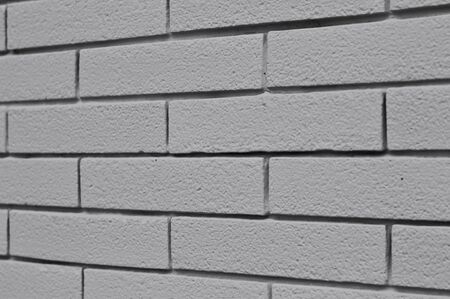 White brick wall background of an old building (Pesaro, Italy, Europe)の写真素材