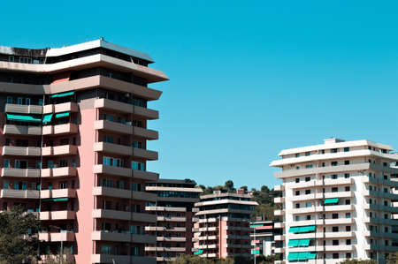 Pink and white buildings with a blue sky background (Pesaro, Italy, Europe)の写真素材