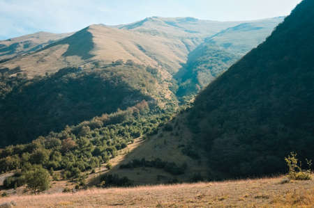 Beautiful italian landscape with hills and mountains on a sunny day (Marche, Italy, Europe)の写真素材