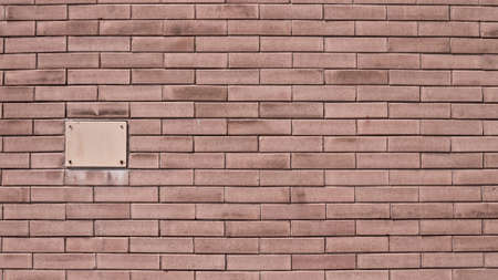 A brick wall with an electrical cabinet (Marche, Italy, Europe)の写真素材