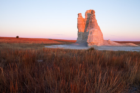 Castle Rock in Kansas is a dramatic 70-foot spire created by erosion of Smoky Hills chalk beds.の写真素材