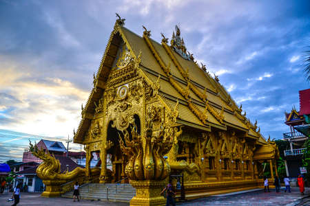 golden temple hall hi light tourist visit at nan province in thailandのeditorial素材