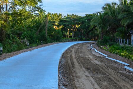 development construction concrete road in thailandの写真素材