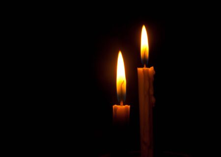 Candle on A black backgroundの写真素材