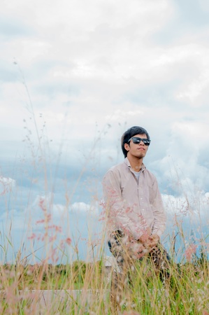 happy young man rest on nature の写真素材