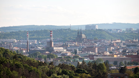 Brno city skyline and Petr and Pavel (Petr and Paul's) cathedral with chimneys around it. A view from Hady quarry.の写真素材