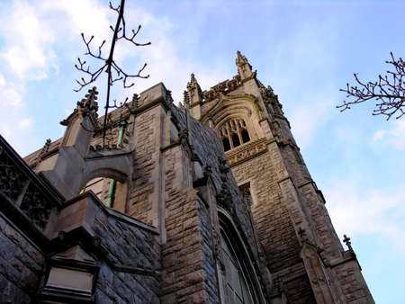 Looking up at church and sky.の写真素材
