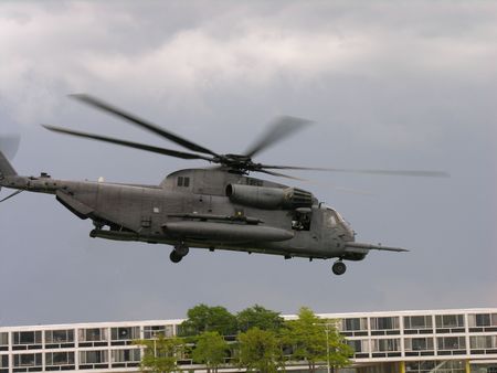 Military helicopter and building.の写真素材