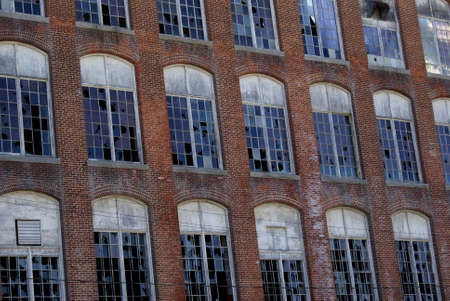 Damaged and vandalized factory building.の写真素材