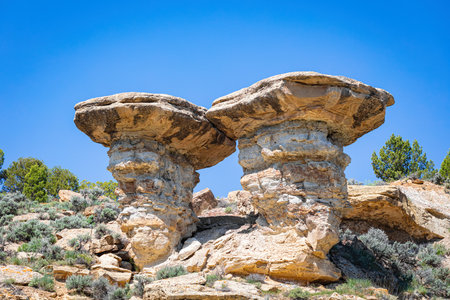 Twin mushroom hoodoo formation in the desert southwest of Colorado.の写真素材