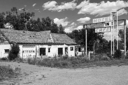 Abandoned gas station, motel, cafe in the ghost town of Texas on Old Historic Route 66, USA. Classic black and white image.の写真素材